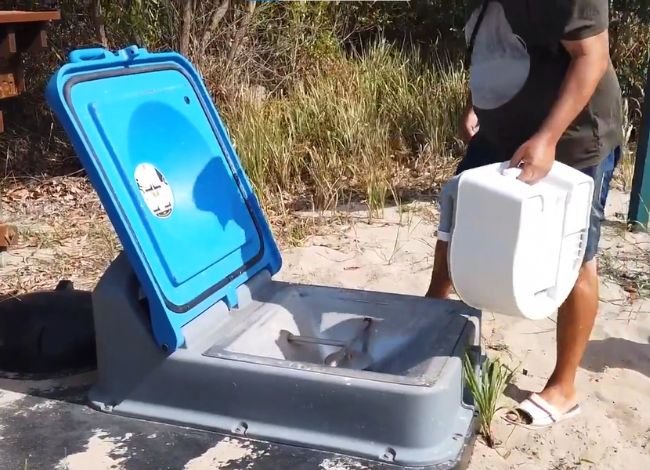 How can I dispose of the garbage from my portable toilet